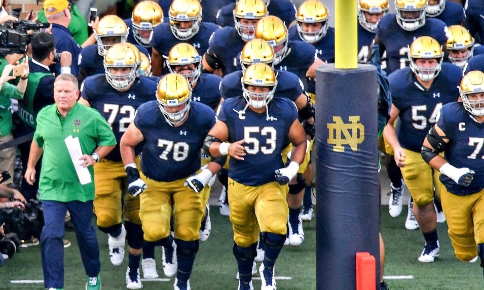 File Transfer: IMG_1003.jpegPhoto of the Notre Dame football team running onto the field