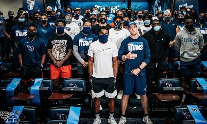 Titans players making a statement on social injustice in the film room