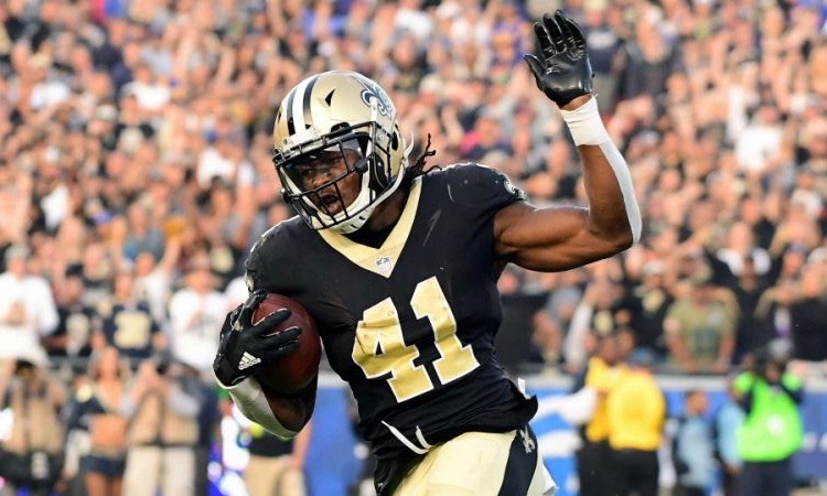 Alvin Kamara with the football during a game